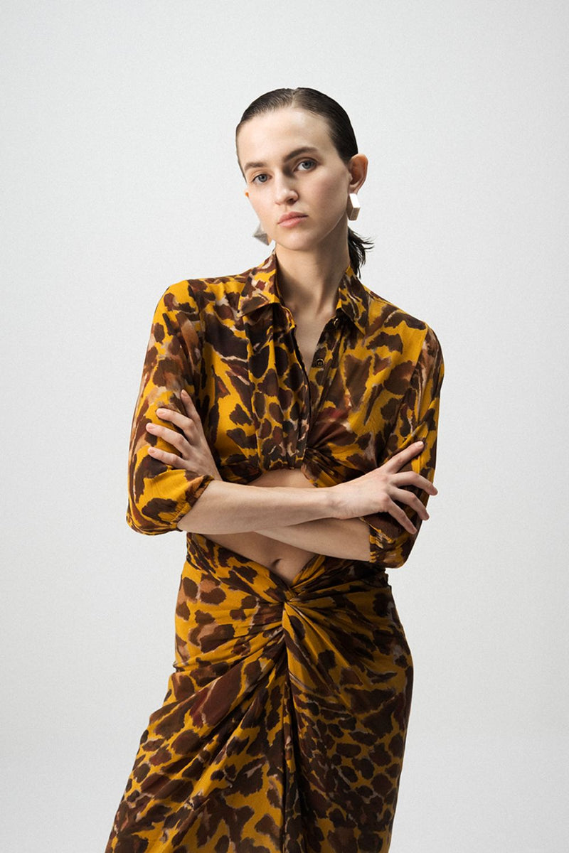 CHITARA TIE UP TOP AND KNOTTED SKIRT SET by Yam in yellow color for women in Singapore