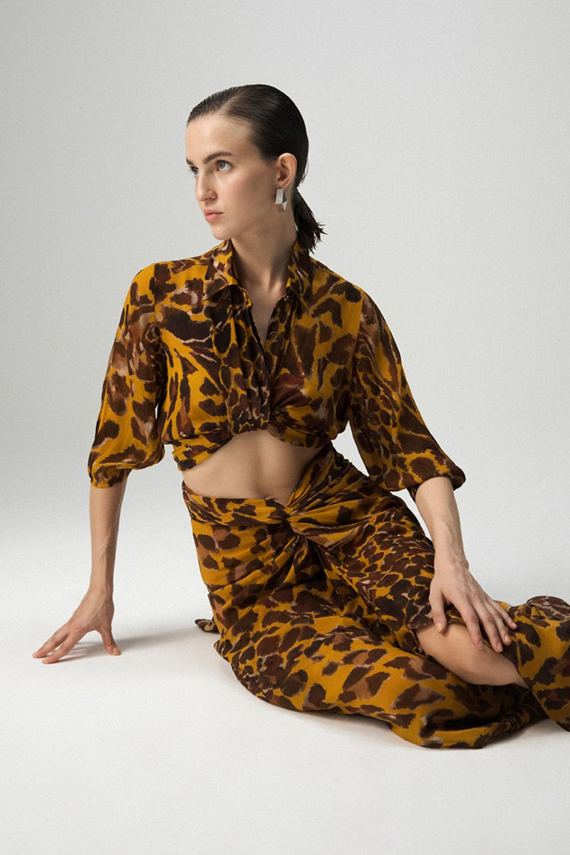 CHITARA TIE UP TOP AND KNOTTED SKIRT SET by Yam in yellow color for women in Singapore