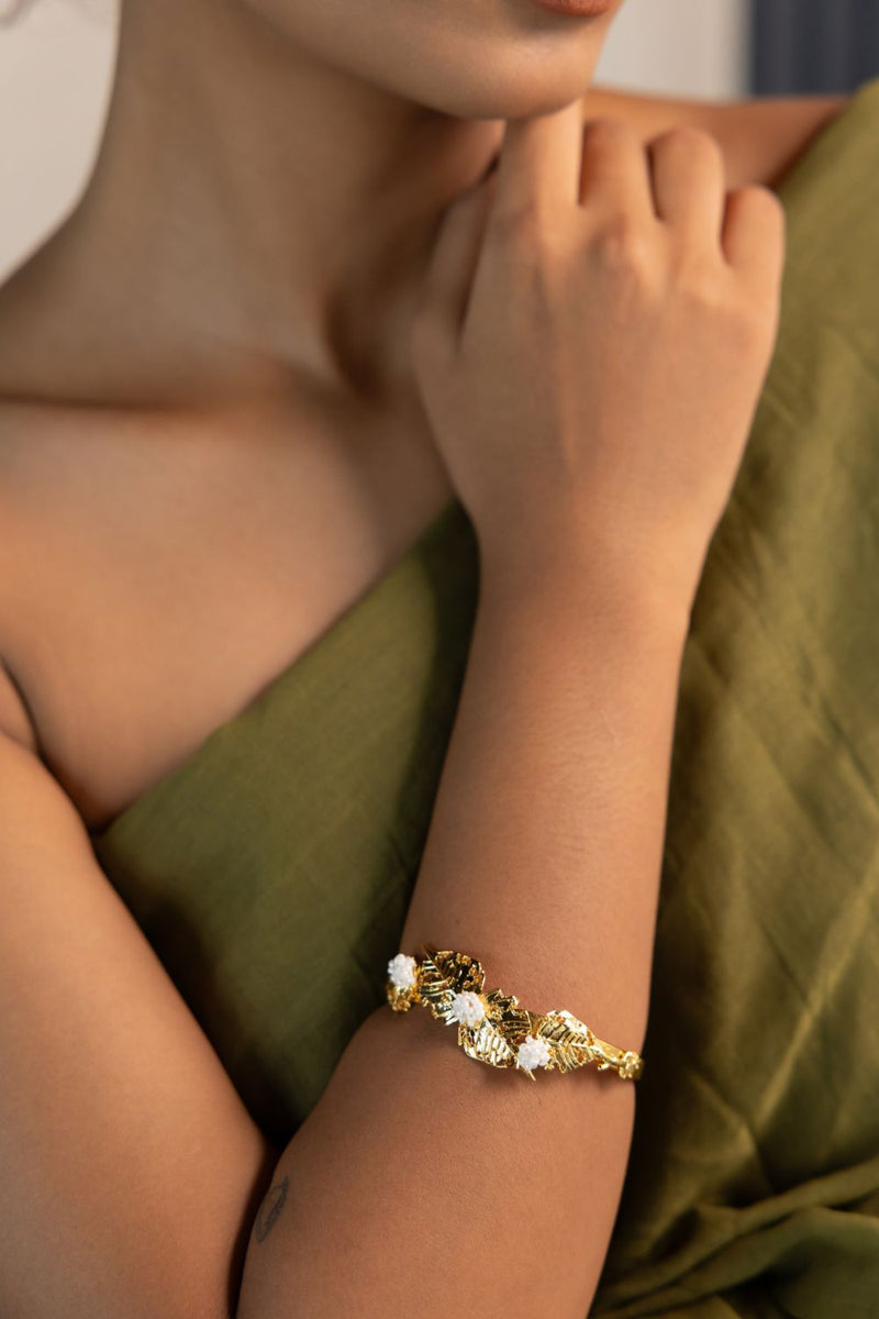Pushpi kada 18k gold plated on brass bangle and bracelet by Aarjavee in gold for women in Singapore