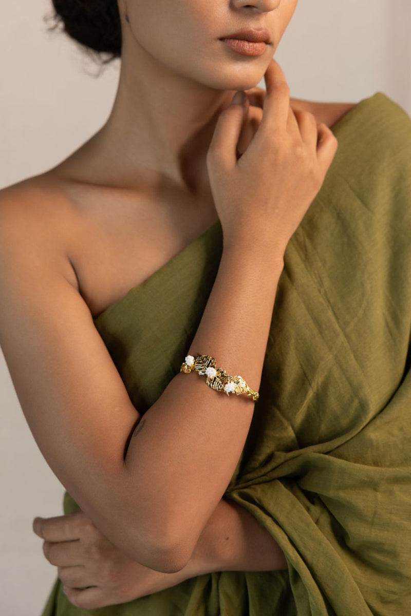 Pushpi kada 18k gold plated on brass bangle and bracelet by Aarjavee in gold for women in Singapore