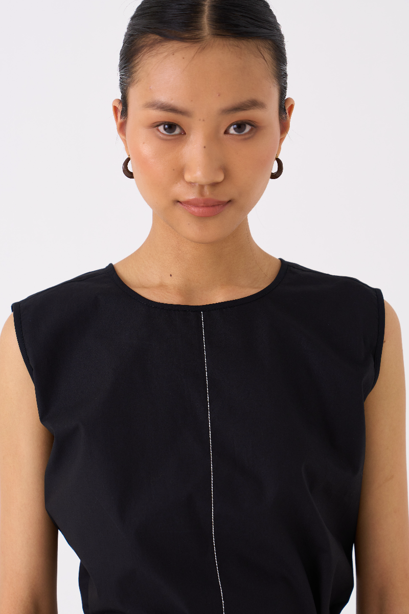 CHECKERED SKIRT CO-ORD 
(SET OF 2)-
BLACK poplin by THREE in black color for women in Singapore