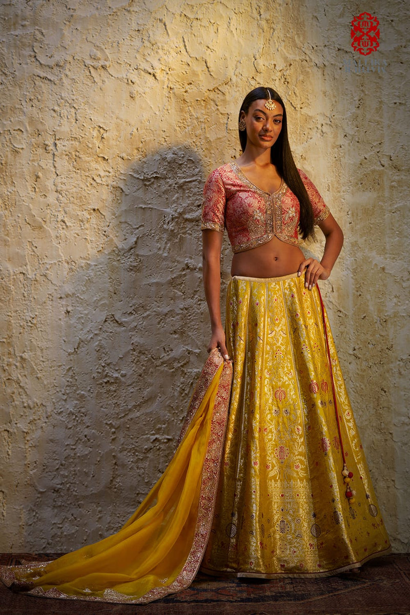 Shaheen Basanti yellow silk brocade lehenga silk Buy Shaheen Basanti yellow silk brocade lehenga from C&W | Lehenga Sets for Women by Mallika Mathur in yellow color for women in Singapore