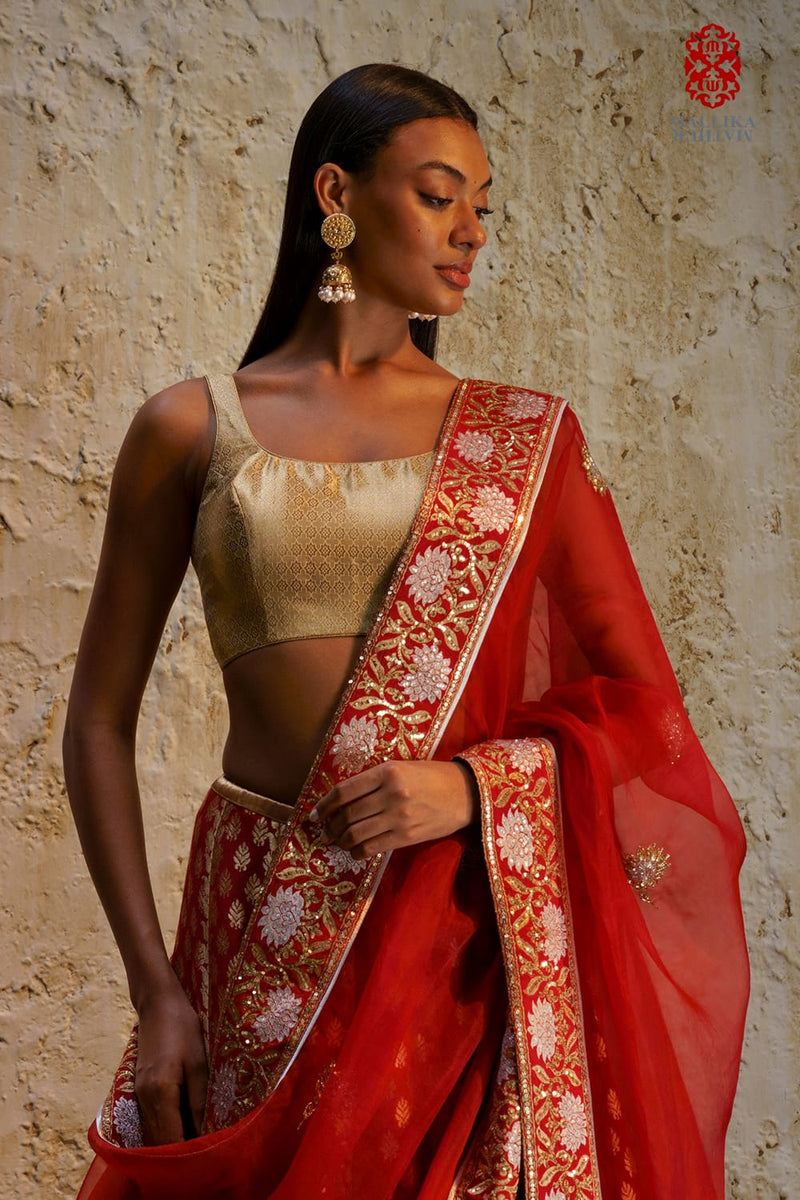 Sitara blouse sleeveless gold zari Buy Sitara blouse sleeveless gold zari from C&W | Blouses for Women by Mallika Mathur in gold color for women in Singapore