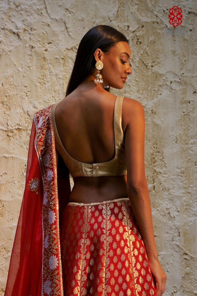 Sitara blouse sleeveless gold zari Buy Sitara blouse sleeveless gold zari from C&W | Blouses for Women by Mallika Mathur in gold color for women in Singapore