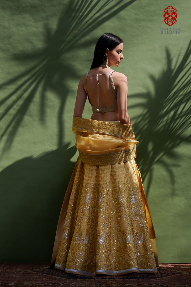 Mehak silk georgette lehenga-butter yellow silk Buy Mehak silk georgette lehenga-butter yellow from C&W | Lehenga Sets for Women by Mallika Mathur in yellow color for women in Singapore