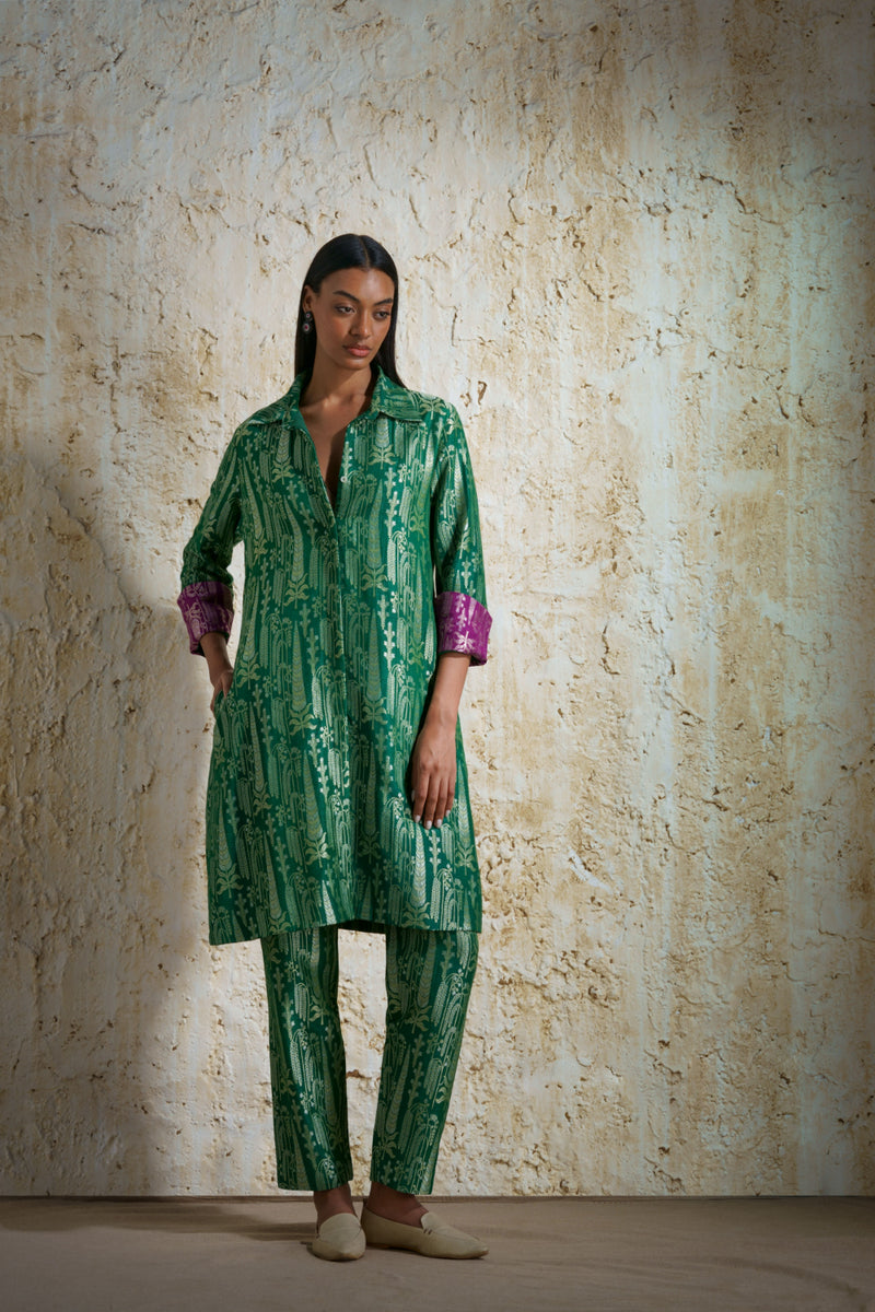 Vriksha collared tunic and slim pants in munga silk-emerald green silk Buy Vriksha collared tunic and slim pants in munga silk-emerald green from C&W | Kurta/Kurta Sets for Women by Mallika Mathur in green color for women in Singapore