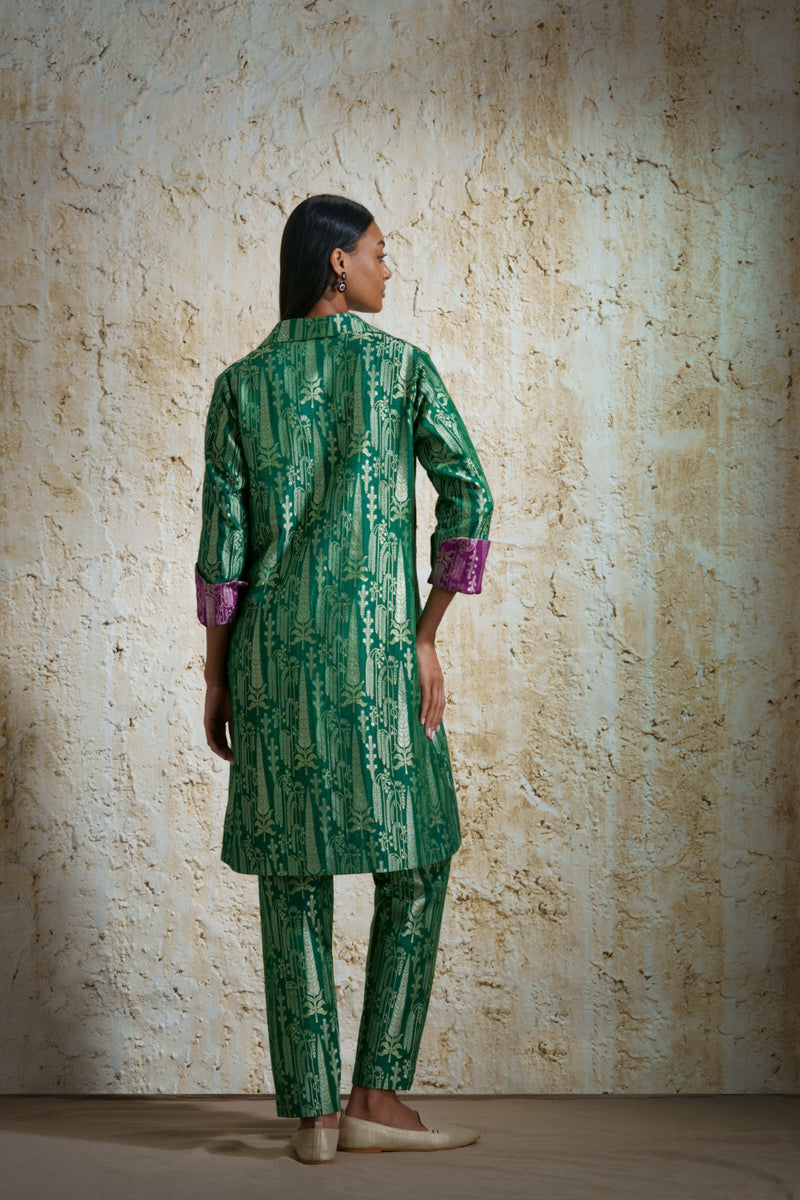 Vriksha collared tunic and slim pants in munga silk-emerald green silk Buy Vriksha collared tunic and slim pants in munga silk-emerald green from C&W | Kurta/Kurta Sets for Women by Mallika Mathur in green color for women in Singapore