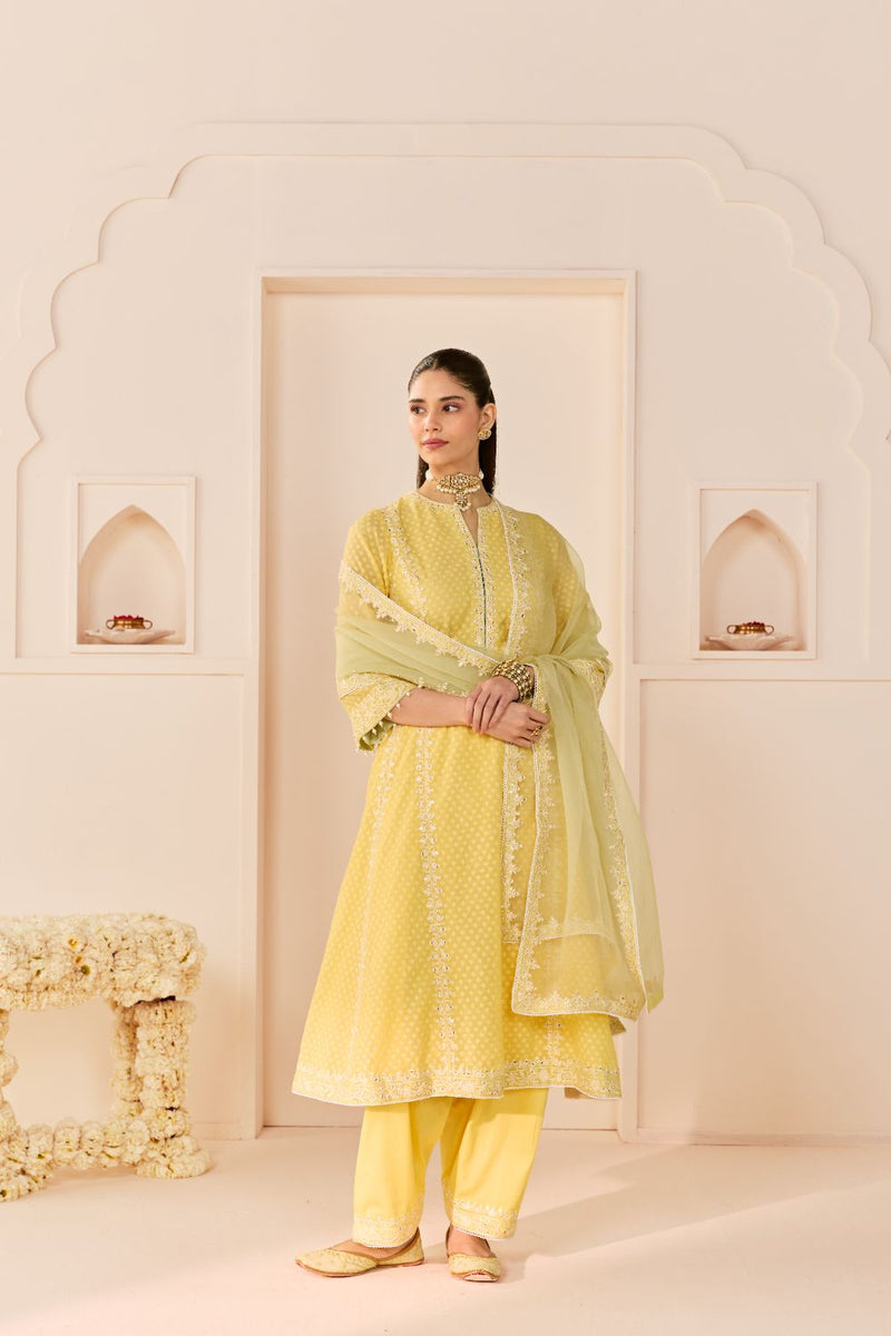 FIRDAUS -LEMON YELLOW LONG KALIDAAR CHAUGA WITH DOGRI SALWAR AND DUPATTA chanderi silk kurta/kurta set by SHEETAL BATRA in lemon yellow with mint green for women in Singapore