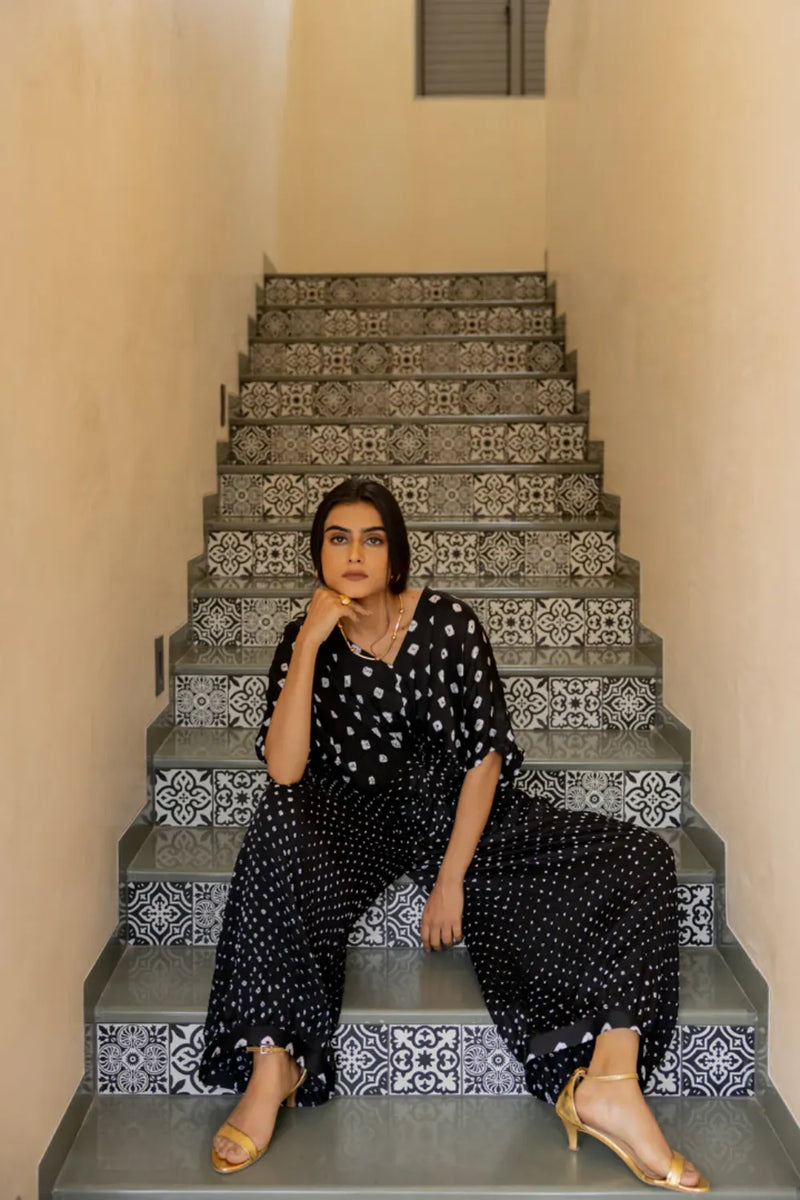 KNOT JUMPSUIT-BLACK silk by Dyelogue in black color for women in Singapore
