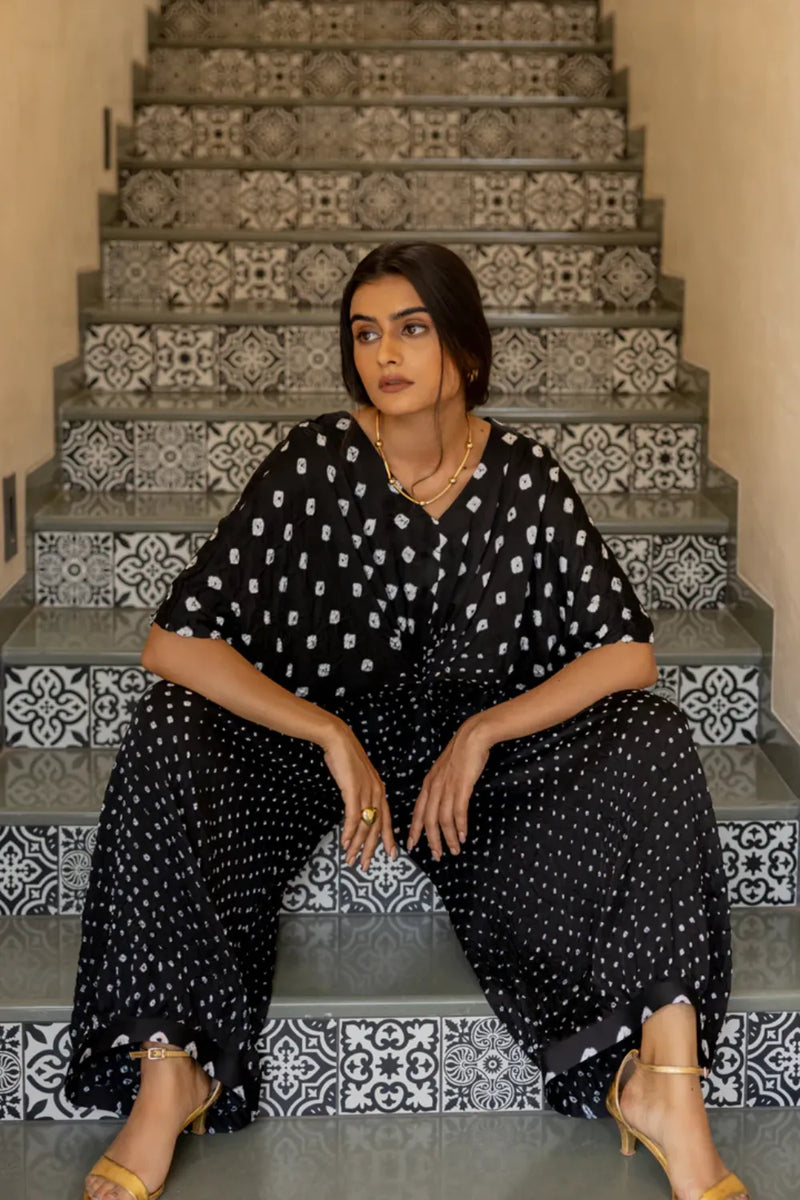 KNOT JUMPSUIT-BLACK silk by Dyelogue in black color for women in Singapore