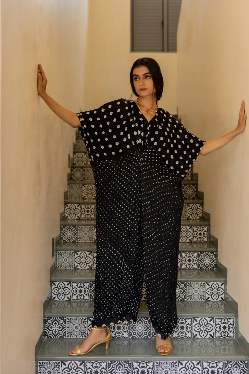 KNOT JUMPSUIT-BLACK silk by Dyelogue in black color for women in Singapore
