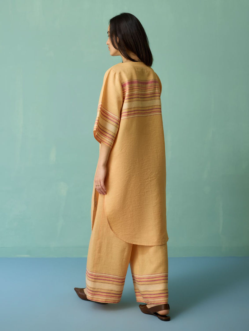 Nami Floral Block-Printed Curved Hem Kurta - Apricot linen light kurta set by Manan in apricot for women in Singapore