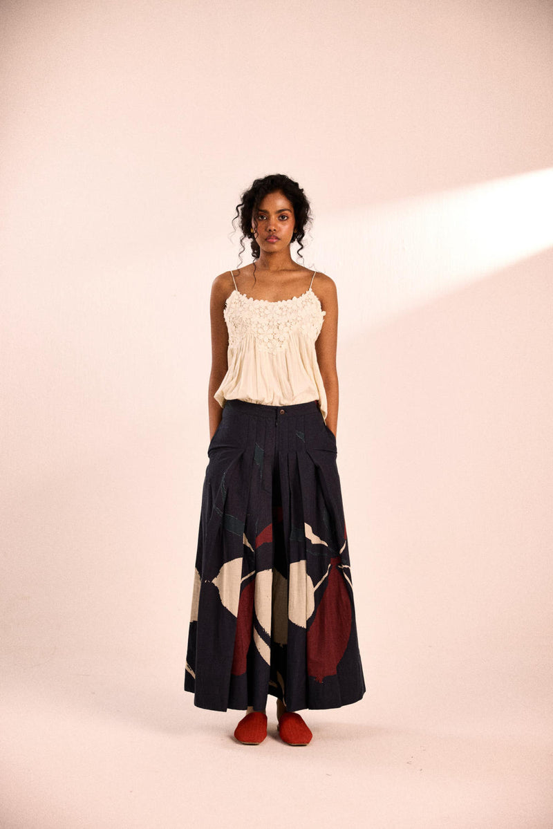 Aba pleated pants by Khara Kapas in black for women in Singapore