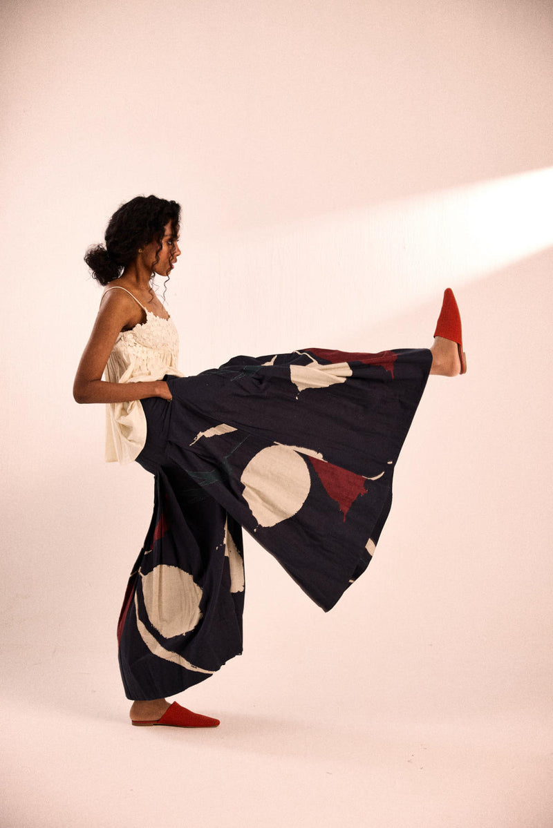 Aba pleated pants by Khara Kapas in black for women in Singapore