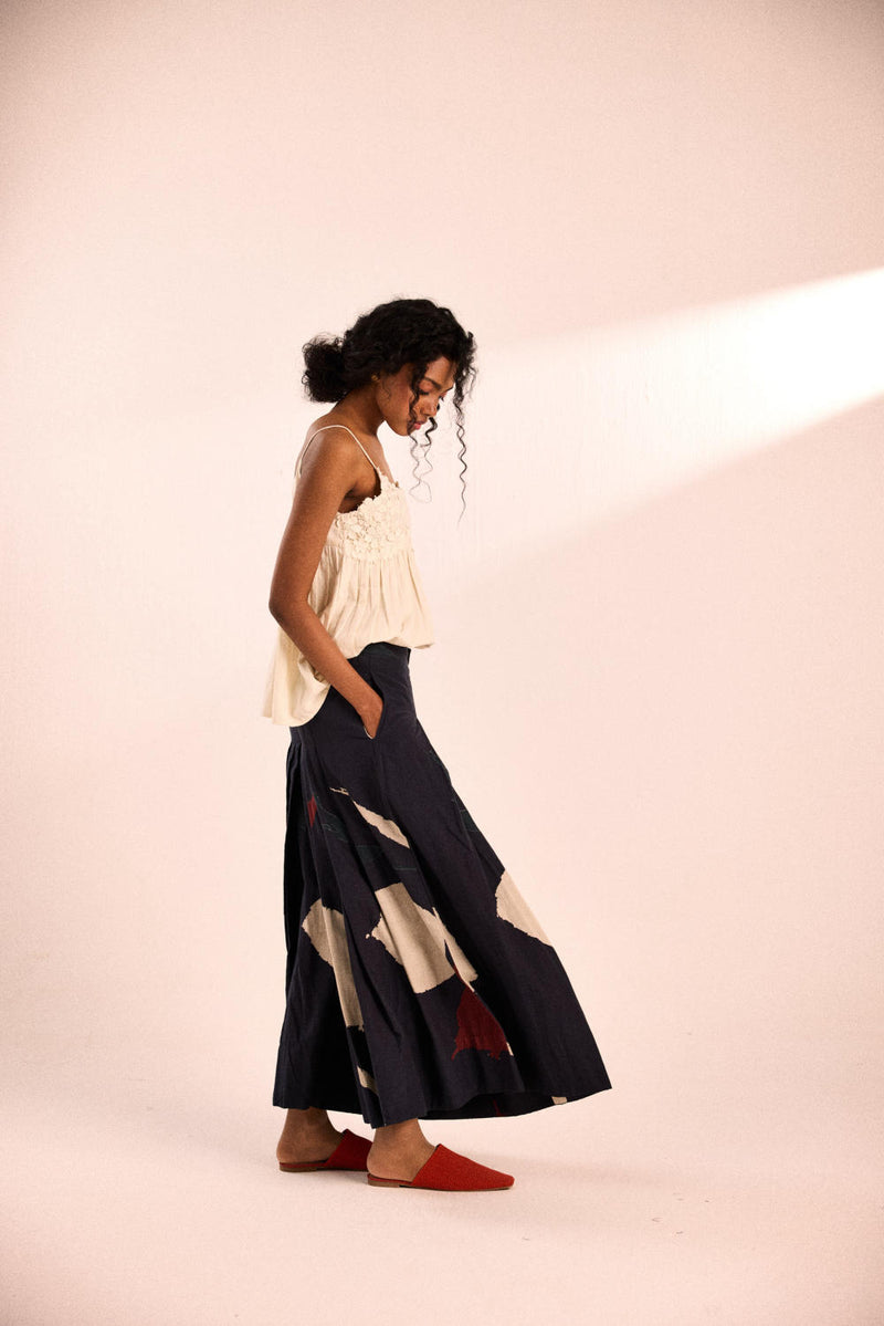Aba pleated pants by Khara Kapas in black for women in Singapore