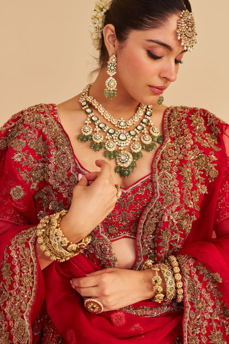 Mahanoor - Dabka Zardozi Embroidered Pure Silk Red Bridal Lehenga Set silk by SHEETAL BATRA in red color for women in Singapore
