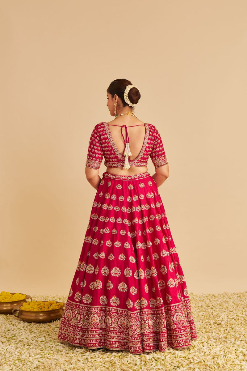 Maira - Dabka Zardozi Embroidered Raw Silk Hotpink Bridal Lehenga Set silk by SHEETAL BATRA in pink color for women in Singapore