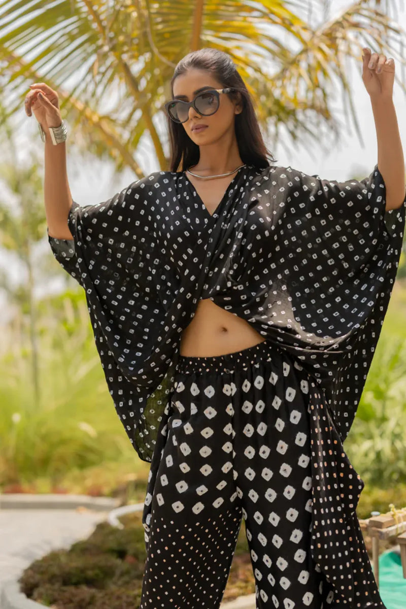 MOD DOTS TWIST TOP-BLACK silk by Dyelogue in black color for women in Singapore