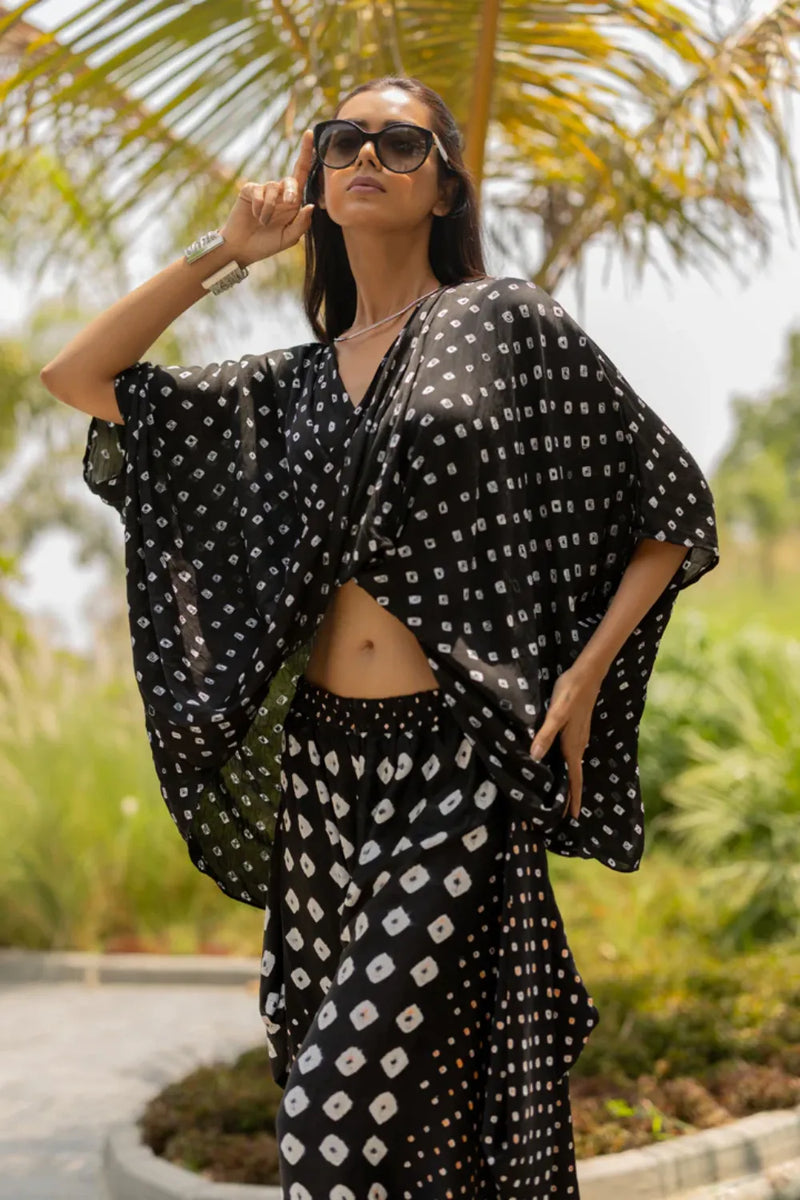 MOD DOTS TWIST TOP-BLACK silk by Dyelogue in black color for women in Singapore