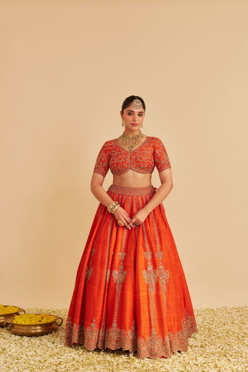 Naazila - Dabka Zardozi Embroidered Raw Silk Burnt Orange Lehenga Set silk by SHEETAL BATRA in orange color for women in Singapore