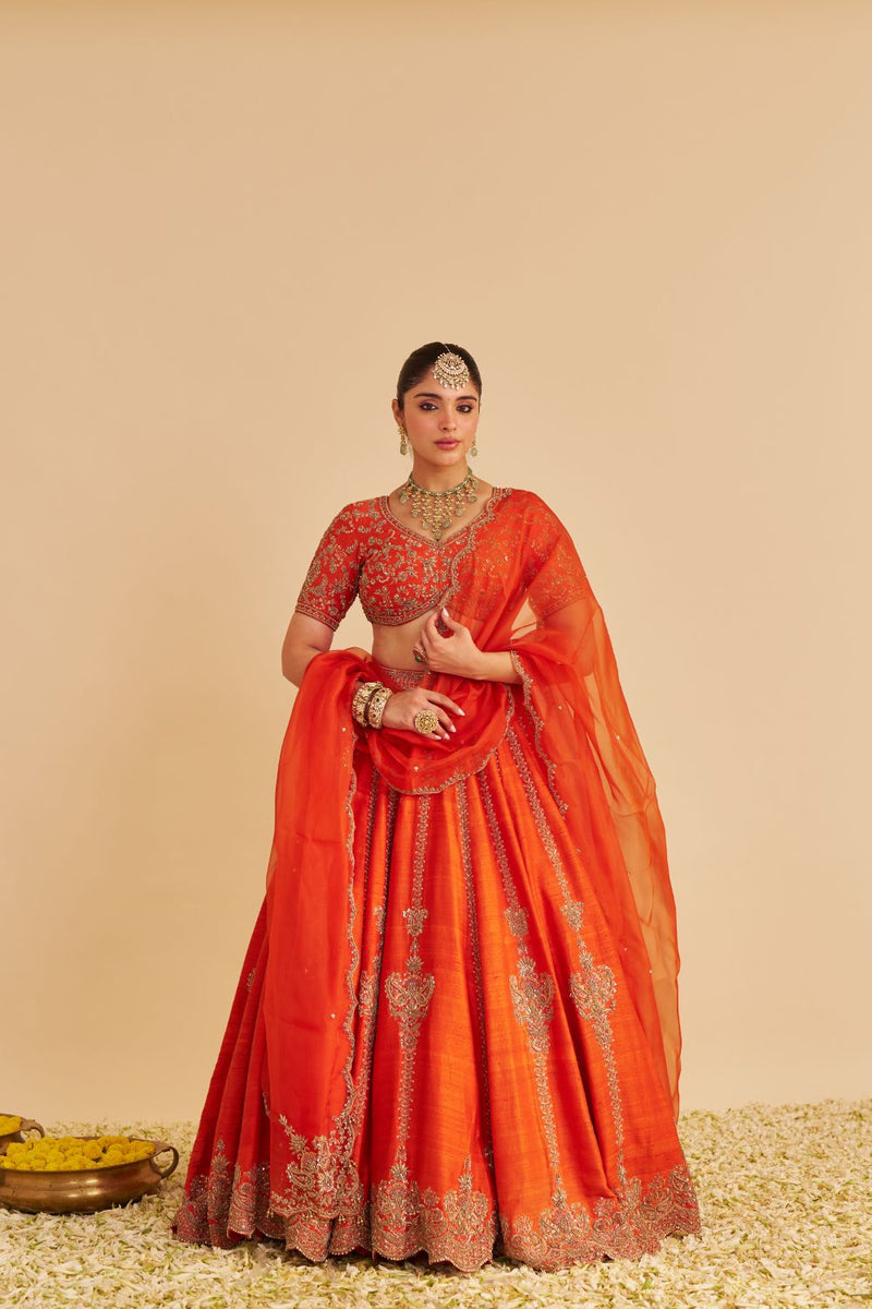 Naazila - Dabka Zardozi Embroidered Raw Silk Burnt Orange Lehenga Set silk by SHEETAL BATRA in orange color for women in Singapore