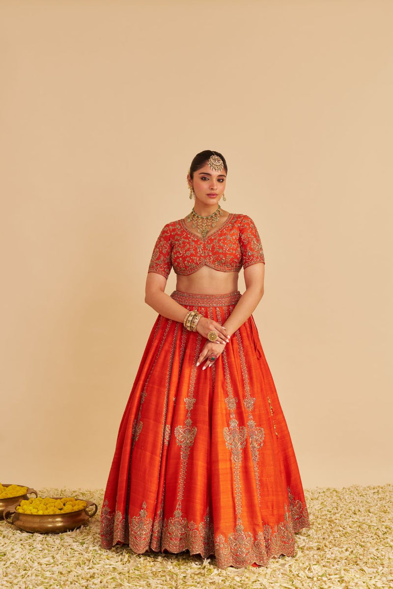 Naazila - Dabka Zardozi Embroidered Raw Silk Burnt Orange Lehenga Set silk by SHEETAL BATRA in orange color for women in Singapore