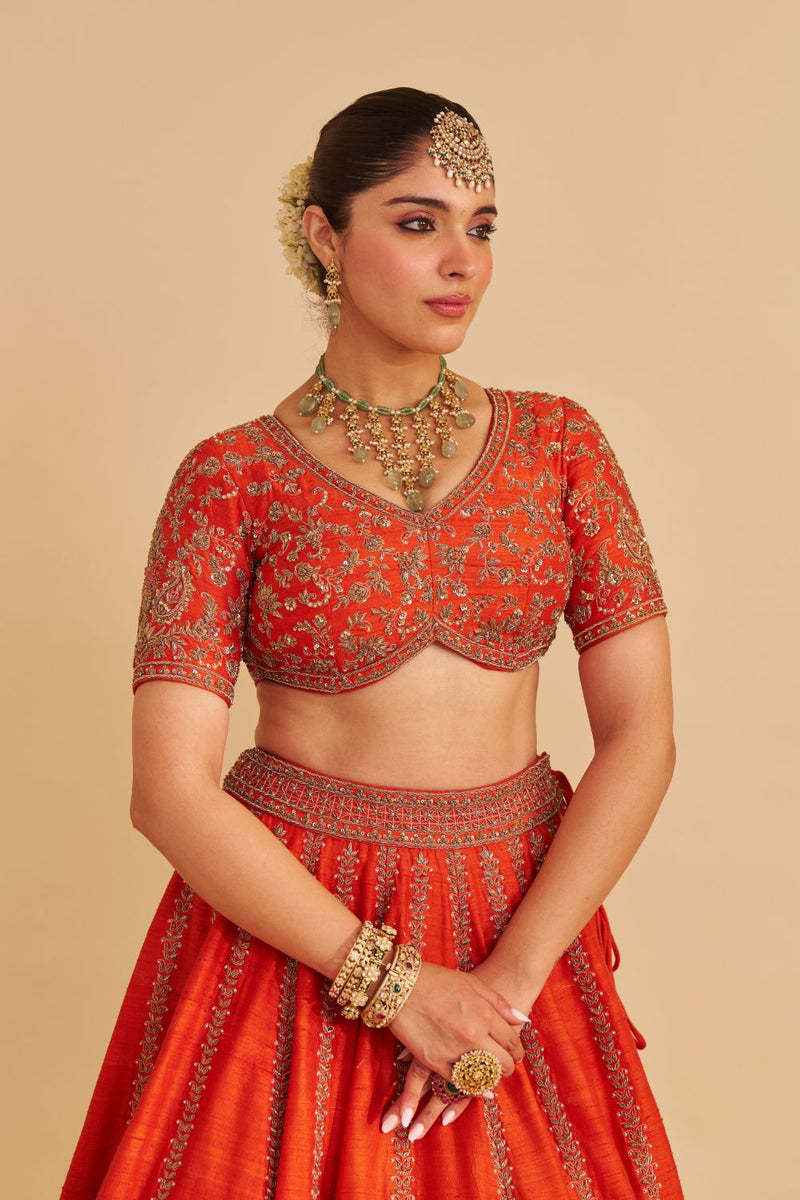 Naazila - Dabka Zardozi Embroidered Raw Silk Burnt Orange Lehenga Set silk by SHEETAL BATRA in orange color for women in Singapore