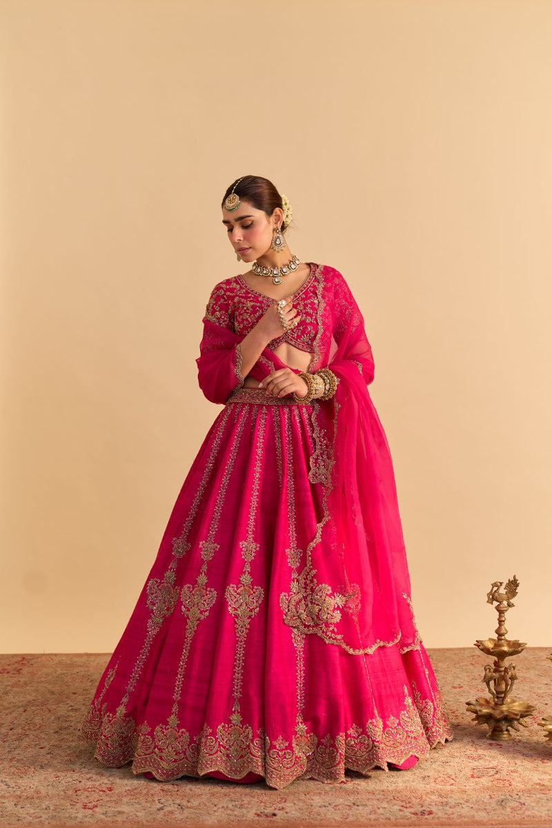 Naazila - Dabka Zardozi Embroidered Raw Silk Hotpink Lehenga Set by SHEETAL BATRA in pink color for women in Singapore