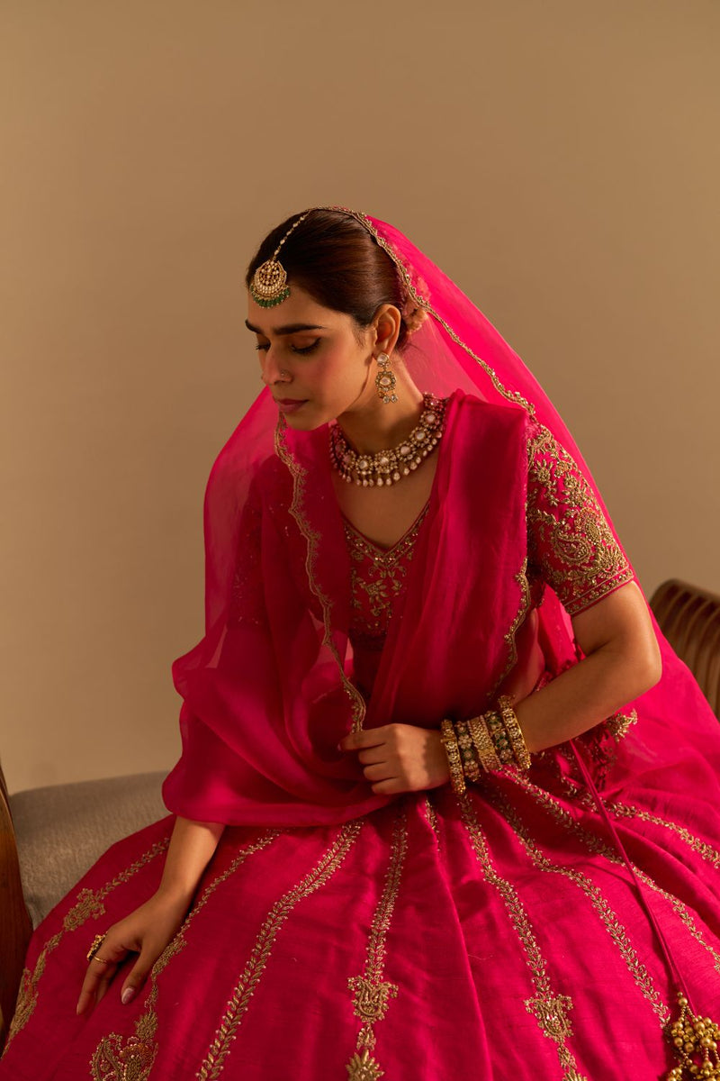 Naazila - Dabka Zardozi Embroidered Raw Silk Hotpink Lehenga Set by SHEETAL BATRA in pink color for women in Singapore