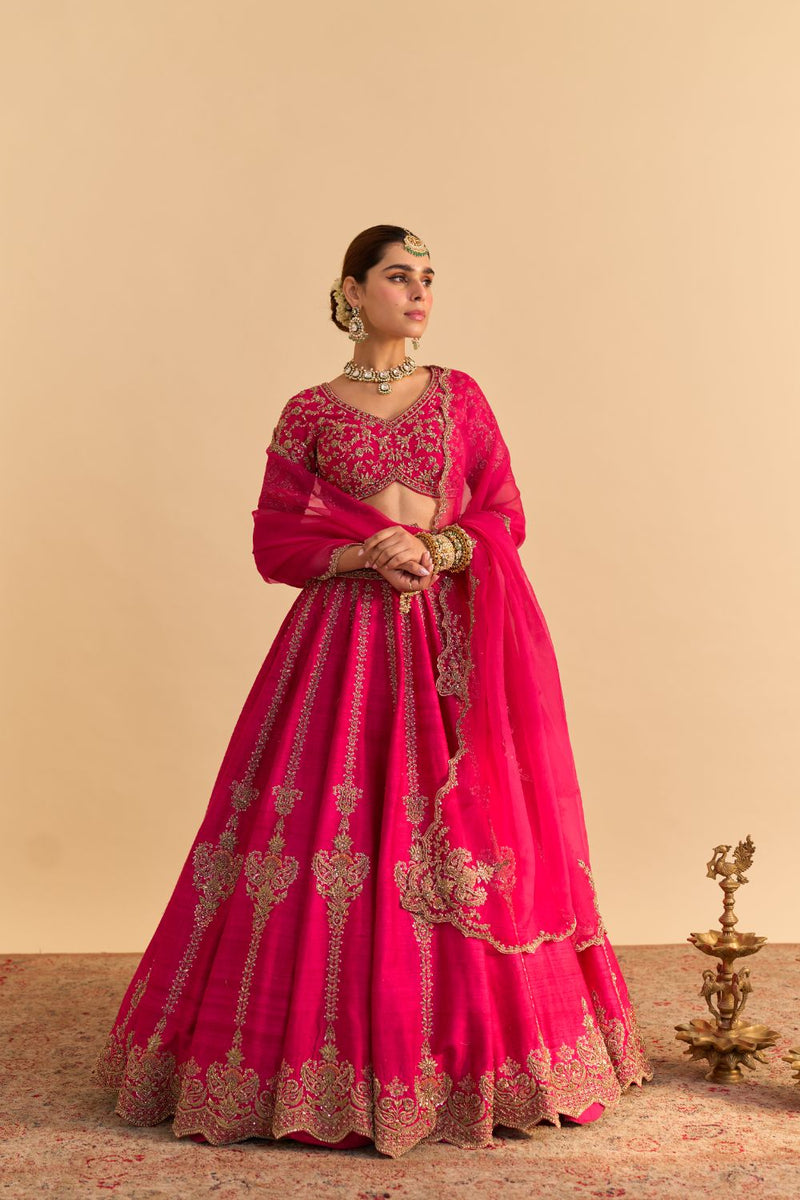 Naazila - Dabka Zardozi Embroidered Raw Silk Hotpink Lehenga Set by SHEETAL BATRA in pink color for women in Singapore