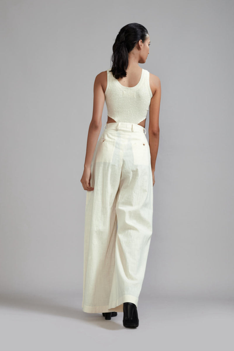 Off-White Long Pleated Trouser cotton Pants/Trousers by Mati in white color for women in Singapore