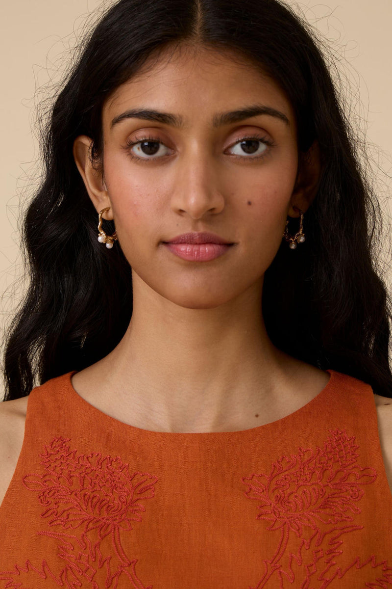 Olena Orange Embroidered Top cotton by The Summer House in orange color for women in Singapore