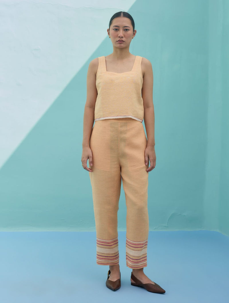 Ines Border Linen Tapered Pants - Apricot linen pant/trouser by Manan in apricot for women in Singapore