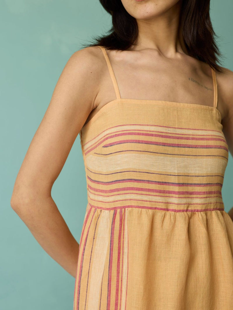 Pera Border Linen Tiered Dress - Apricot linen dress by Manan in apricot for women in Singapore