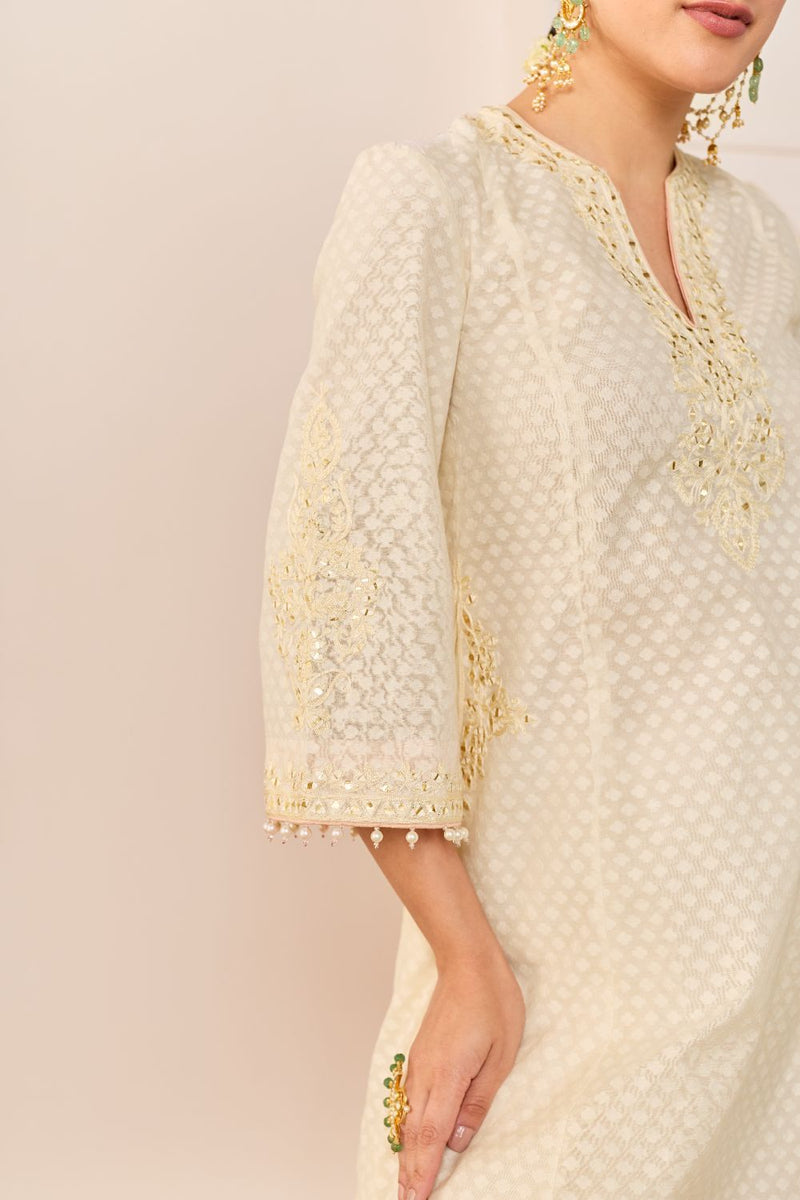REEM - DAISY IVORY SHORT CHOGA WITH DOGRI SALWAR chanderi silk kurta/kurta set by SHEETAL BATRA in daisy iovry with carnation pink for women in Singapore
