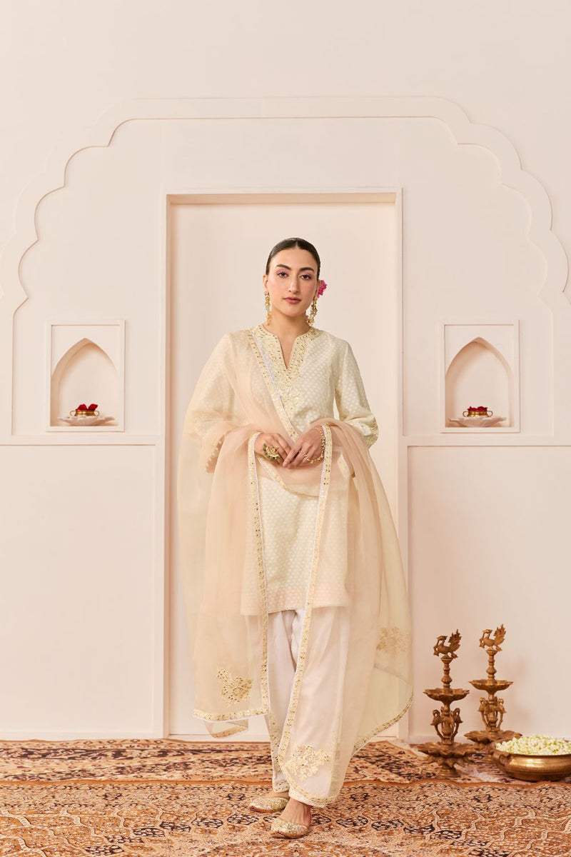 REEM - DAISY IVORY SHORT CHOGA WITH DOGRI SALWAR chanderi silk kurta/kurta set by SHEETAL BATRA in daisy iovry with carnation pink for women in Singapore
