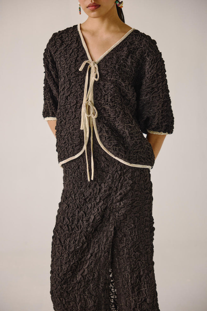 Ruffled top-Black cotton by CORD for women in Singapore