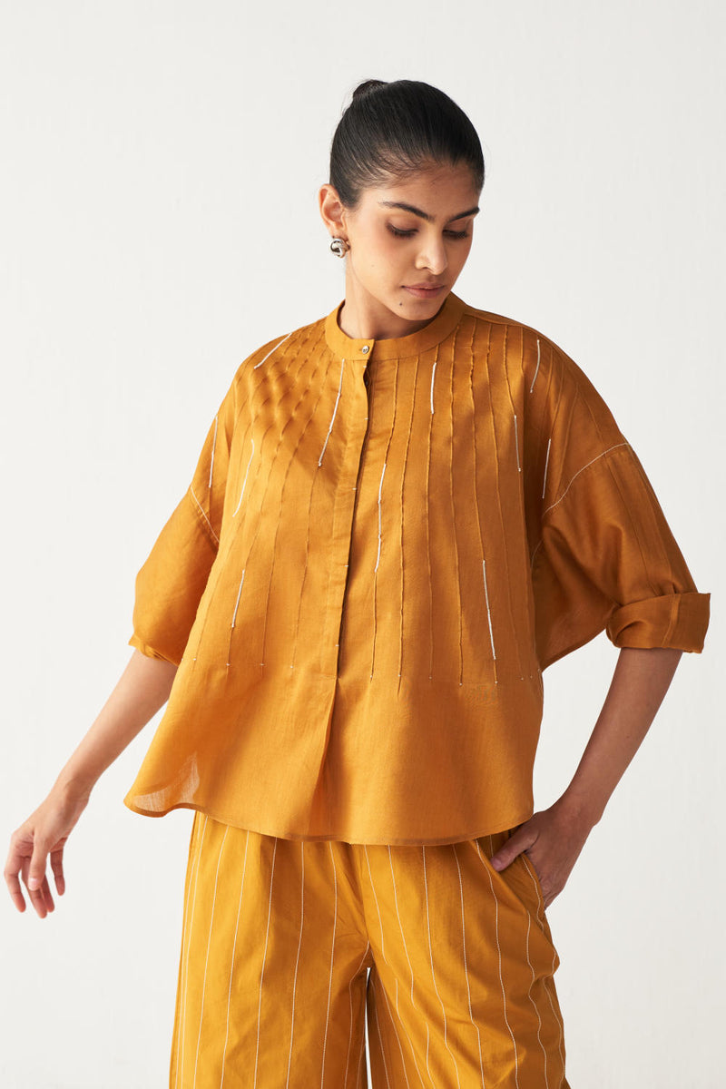 PINTUCK BAT SLEEVE TOP-MUSTARD chanderi by THREE in mustard color for women in Singapore