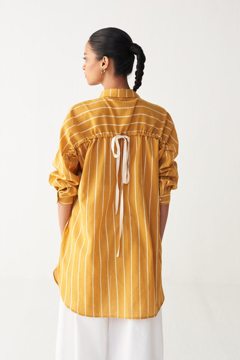 DRAWSTRING SHIRT -MUSTARD mul by THREE in mustard color for women in Singapore