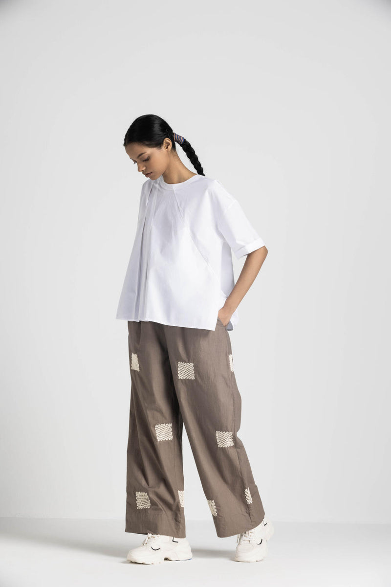 ASYMMETRIC PLEAT TOP - WHITE poplin by THREE in white color for women in Singapore