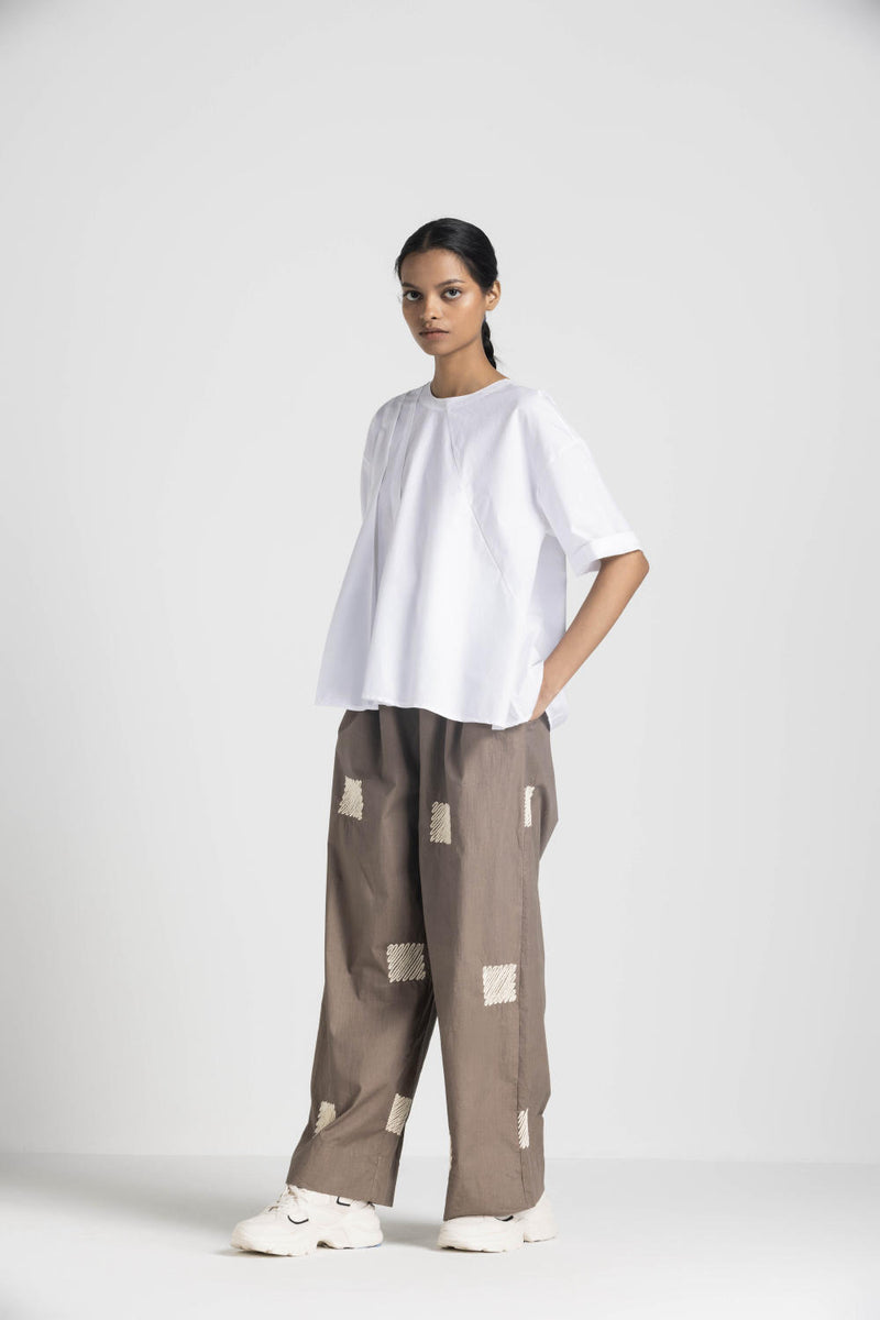 ASYMMETRIC PLEAT TOP - WHITE poplin by THREE in white color for women in Singapore