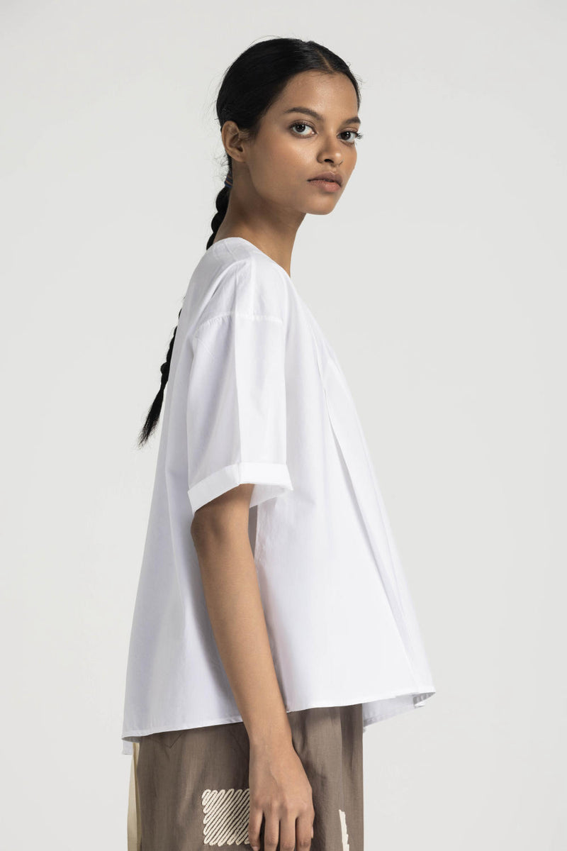 ASYMMETRIC PLEAT TOP - WHITE poplin by THREE in white color for women in Singapore
