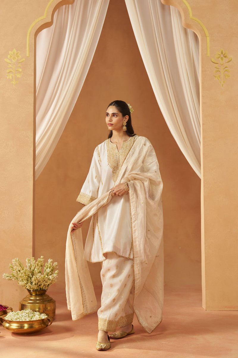 Maahgul Daisy Ivory Kalidaar Chauga with Salwar and Dupatta silk chanderi kurta/kurta set by SHEETAL BATRA in ivory for women in Singapore