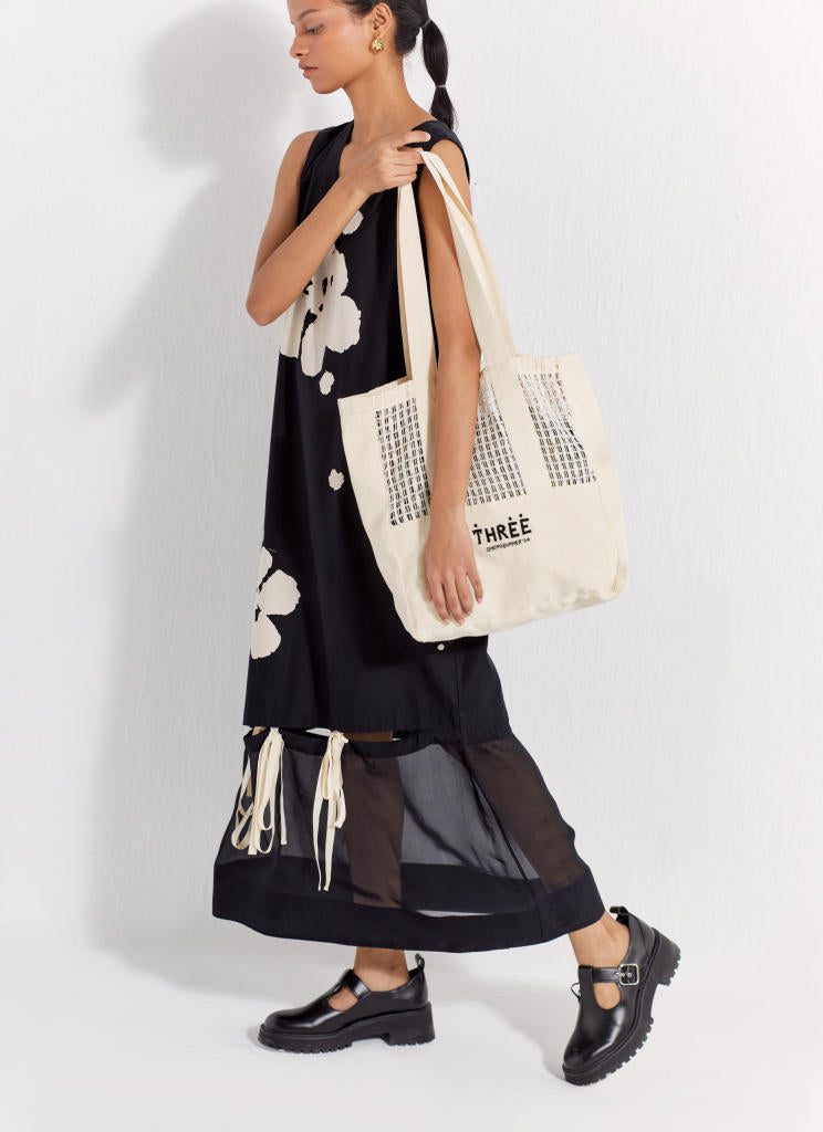 SELF-TIE FLORAL DRESS - BLACK poplin by THREE in black color for women in Singapore