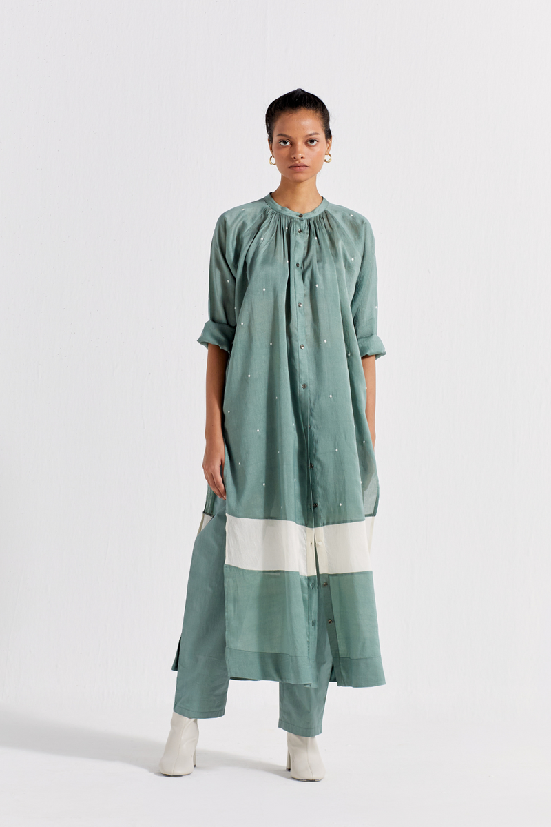 PANEL GATHER NECK SHIRT - JADE POLKA chanderi by THREE in mint color for women in Singapore