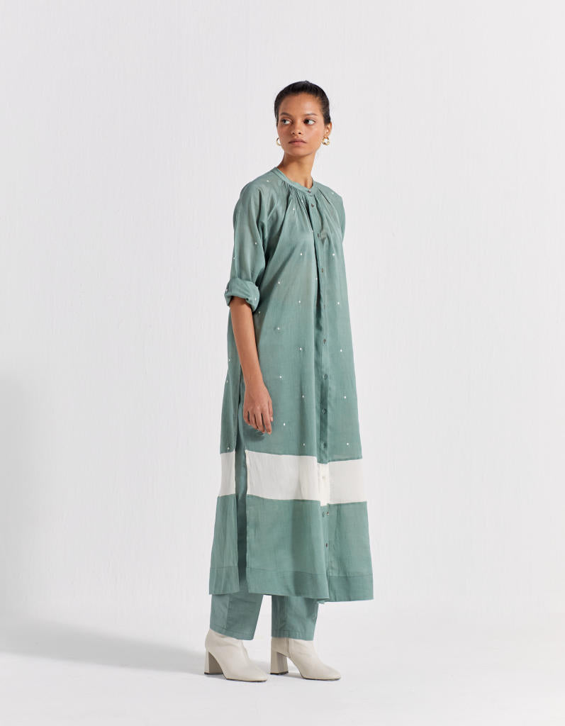 PANEL GATHER NECK SHIRT - JADE POLKA chanderi by THREE in mint color for women in Singapore