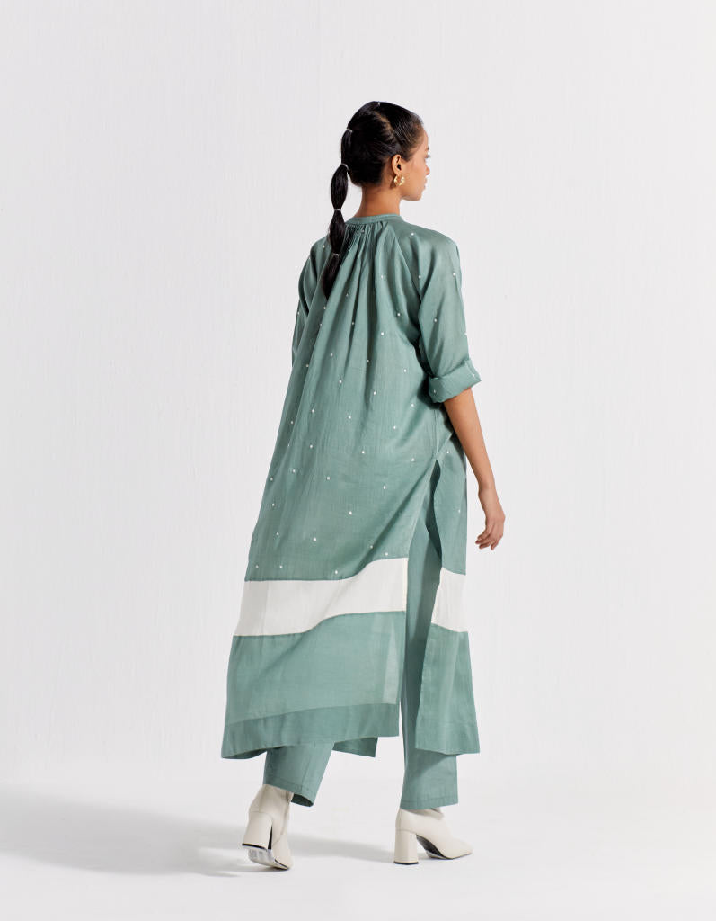 PANEL GATHER NECK SHIRT - JADE POLKA chanderi by THREE in mint color for women in Singapore