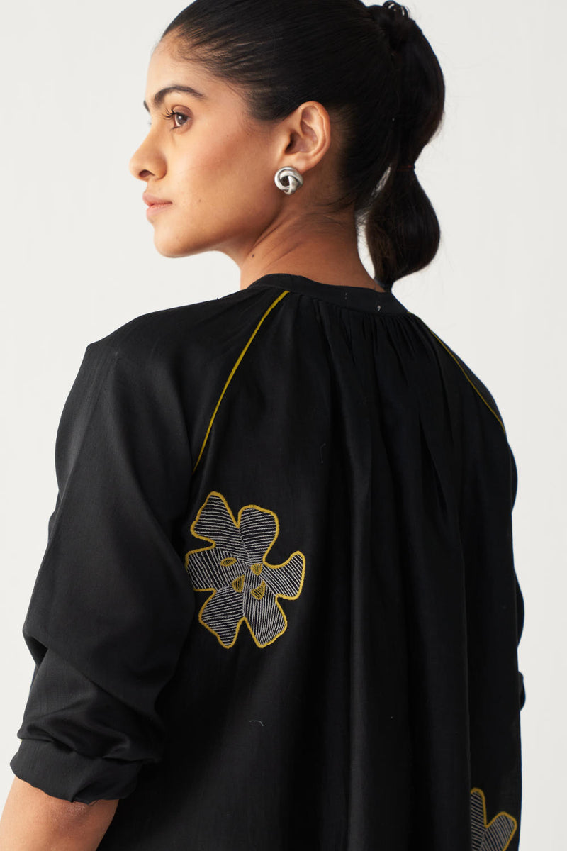 FLORAL EMB. GATHER NECK SHIRT-BLACK chanderi by THREE in black color for women in Singapore