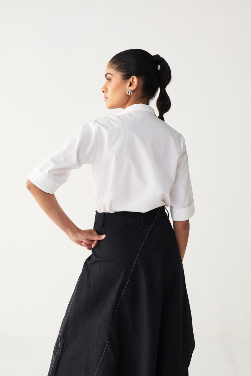 EMB. HANDKERCHIEF SKIRT-BLACK cotton by THREE in black color for women in Singapore