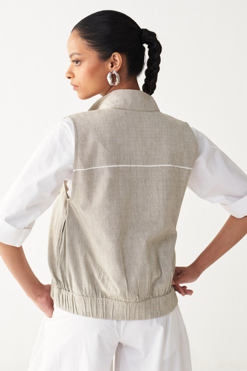SLEEVELESS EMB. POCKET BOMBER -BEIGE cotton by THREE in beige color for women in Singapore